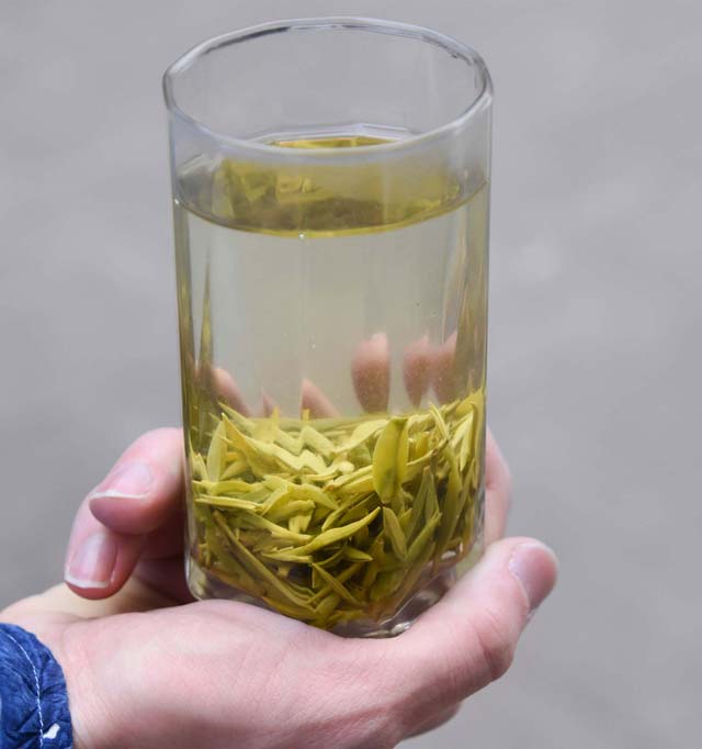 Drink Dragonwell tea prepared simply - loose leaf tea and hot water in a cup! Drink Dragonwell tea prepared simply - loose leaf tea and hot water in a cup!