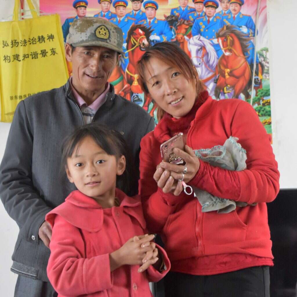 Mr. Li with his daughter and granddaughter